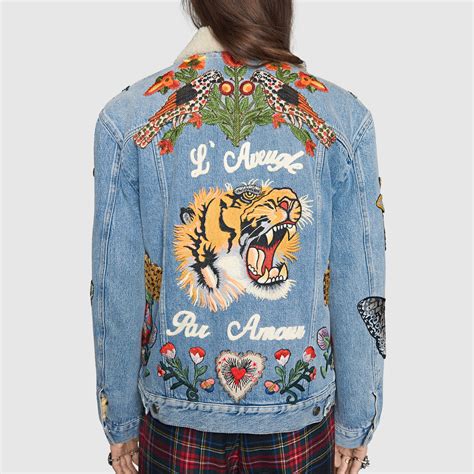 gucci denim jacket with embroidered tiger on the back|Gucci jean jacket with snake.